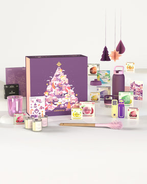 Advent Calendar Large featuring a Christmas tree design on a purple box. Shows the content of limited edition accessories, bottles, drinkware, and bestselling flavors, perfect for festive storage.